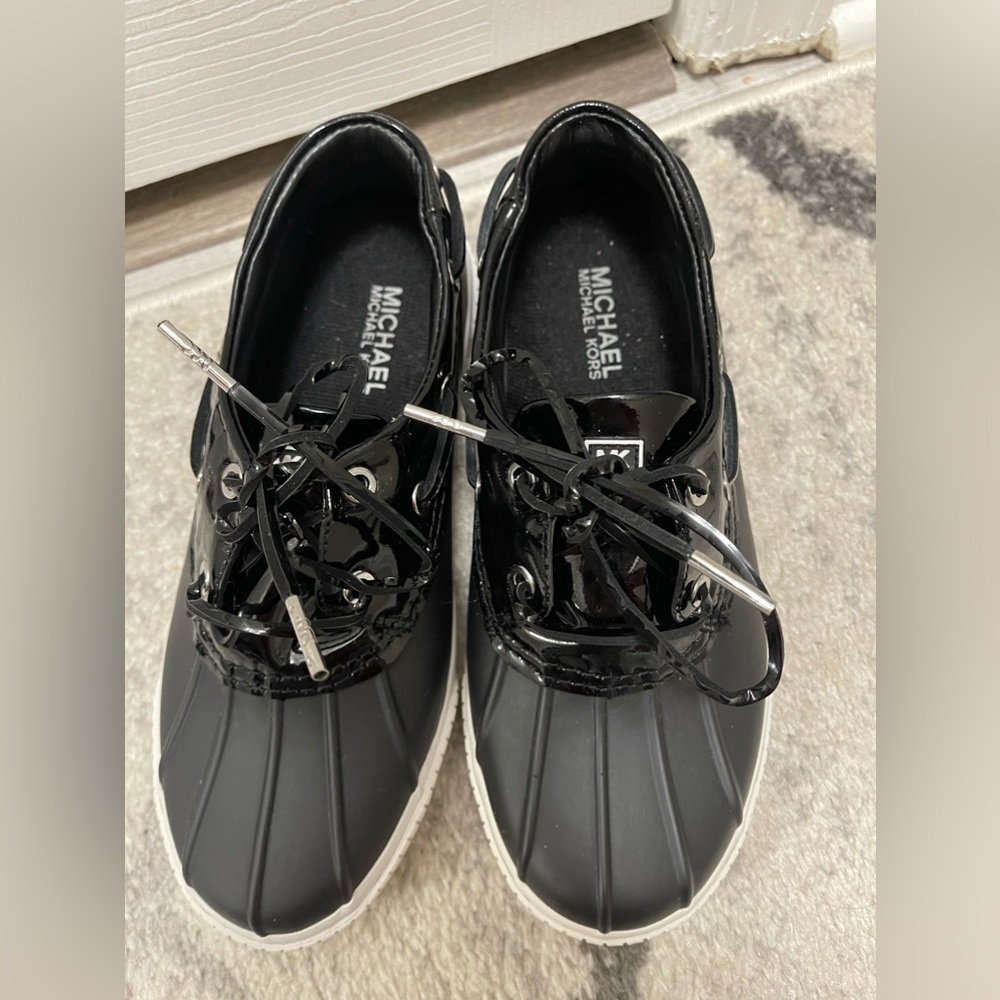 Michael kors wore onec great condition black snow or rain Shose in women size 6